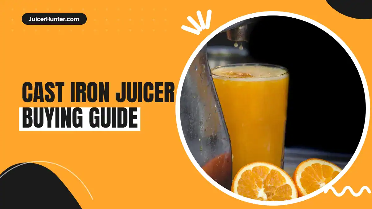 Cast iron juicer press with a lever handle, fresh orange and a glass of orange juice