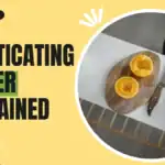 What Is a Masticating Juicer? How It Works, Pros & Cons Vertical masticating juicer with kale, carrot and a glass of green juice